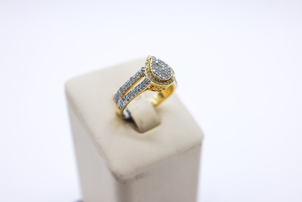 10K Gold 0.72 CTW Multi-Diamond Pear Frame Engagement Ring