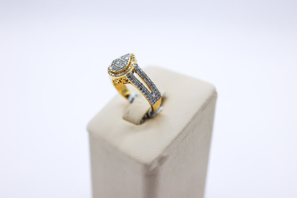 10K Gold 0.72 CTW Multi-Diamond Pear Frame Engagement Ring